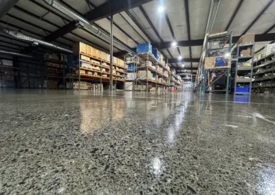 Retail stockroom with a polished aggregate floor coating