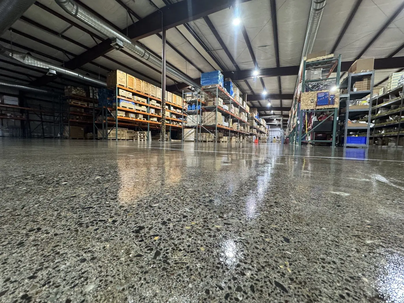Retail stockroom with a polished aggregate floor coating