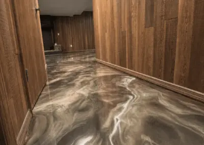 Hallway with a gold and brown metallic epoxy floor