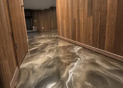 Hallway with a gold and brown metallic epoxy floor